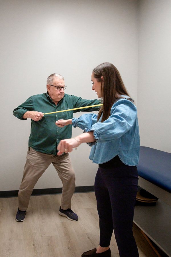 Resistance band exercise with a therapist