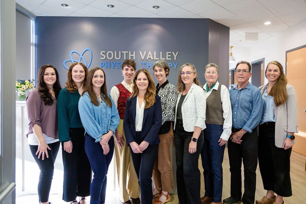 The South Valley Physical Therapy team in the clinic lobby